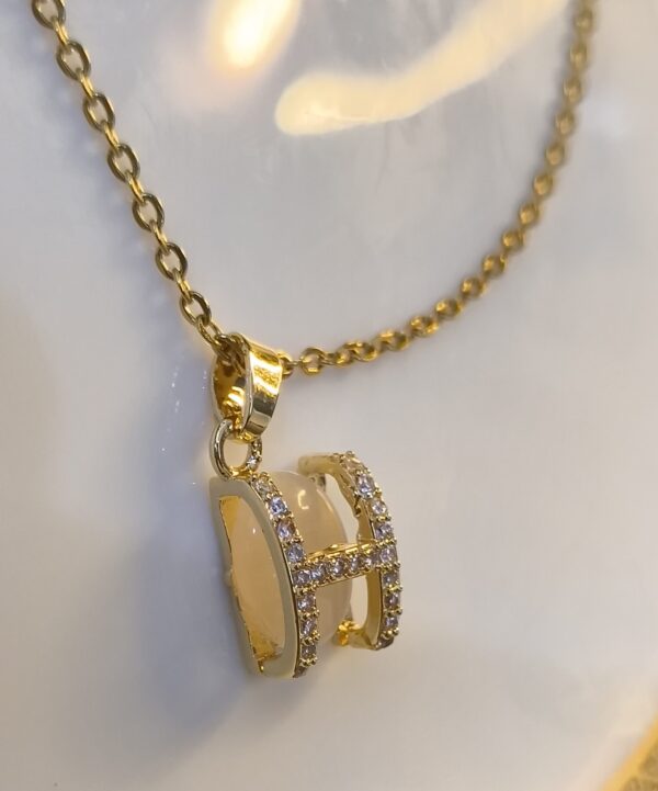 IMG_20250425_163950540 (1) "Golden Alphabet Charm Necklace – H"